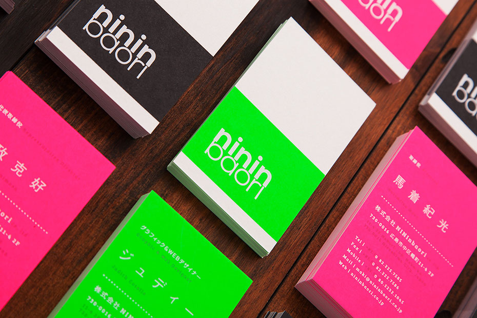 creative agency's visual identity: fluorescent ink business cards