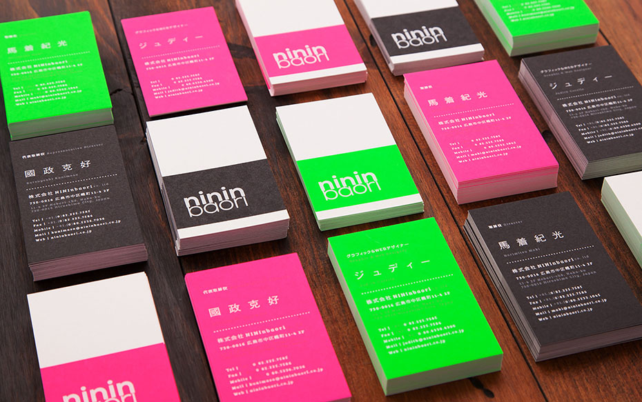 creative agency's visual identity: fluorescent ink and hot-stamped business cards