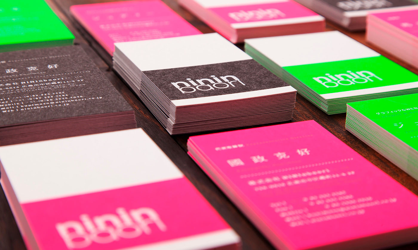 business cards printed with fluorescent pink ink